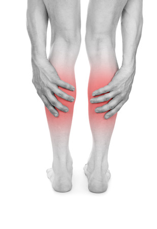 Pain in the legs, isolated on white backgroundの写真素材