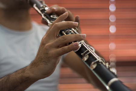 Male musician playing clarineの写真素材