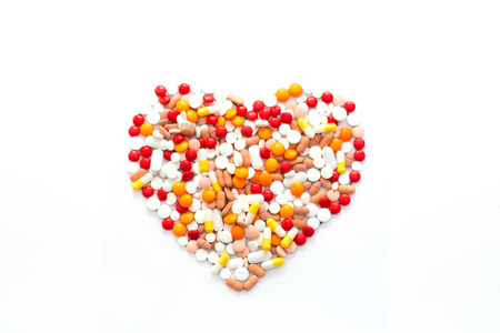 medicine capsules and health concept