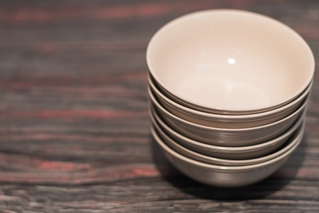 White deep dish on a dark backgroundの写真素材