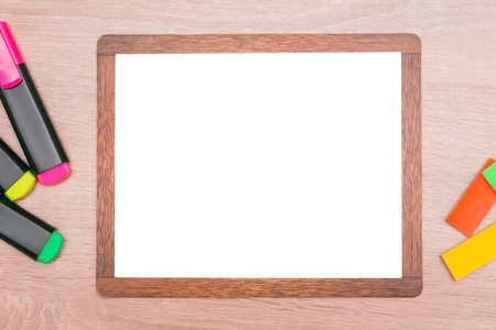 Mock up, on wooden markers background, and background for inserts with wooden frameの写真素材