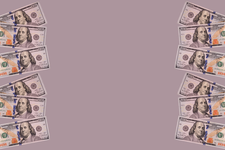 Three banknotes lying on a gray background