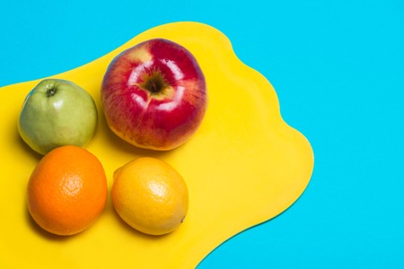 Fruit lying on a cutting boardの写真素材