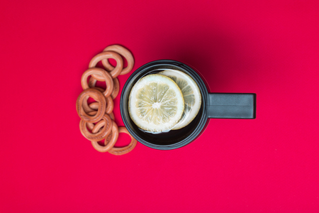 Thermo mug with green, black tea and lemonの写真素材