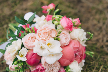 Bouquet of flowers. The brides bouquet. Bridal bouquet. Floristics. Wedding rings.の写真素材