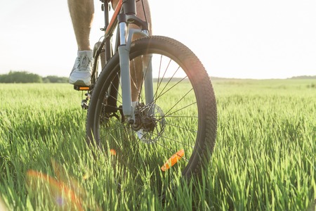 The man is riding a bicycleの写真素材