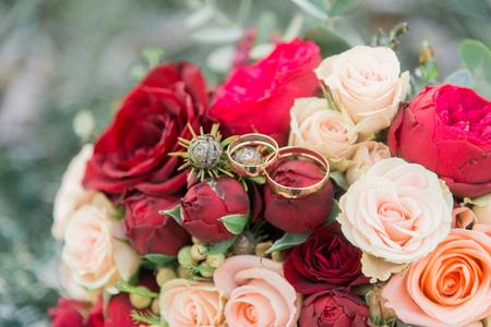 Bouquet of flowers. The bride's bouquet. Bridal bouquet. Floristics. Wedding rings. Wedding bouquet from different colors.の写真素材