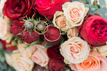 Bouquet of flowers. The bride's bouquet. Bridal bouquet. Floristics. Wedding rings. Wedding bouquet from different colors.の写真素材