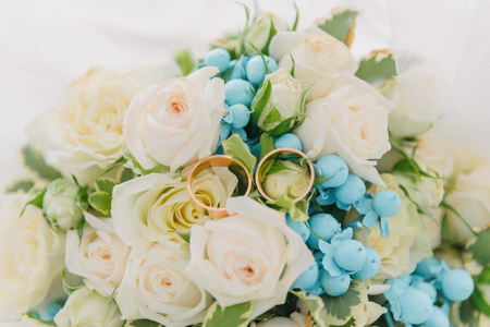 Bouquet of flowers. The bride's bouquet. Bridal bouquet. Floristics. Wedding rings. Wedding bouquet from different colors.の写真素材