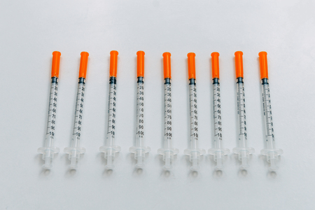 Treatment against addiction. Vaccination of people. Insulin injection. Diabetesの写真素材