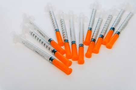 Treatment against addiction. Vaccination of people. Insulin injection. Diabetesの写真素材