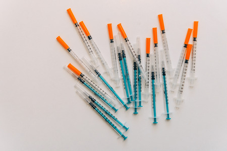 Treatment against addiction. Vaccination of people. Insulin injection. Diabetesの写真素材