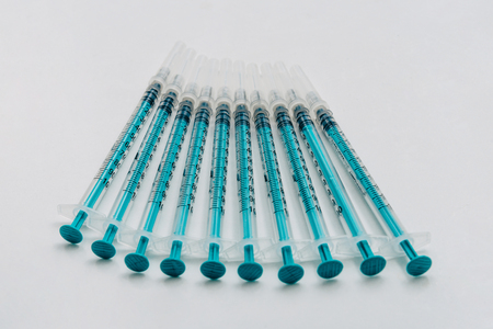 Treatment against addiction. Vaccination of people. Insulin injection. Diabetesの写真素材