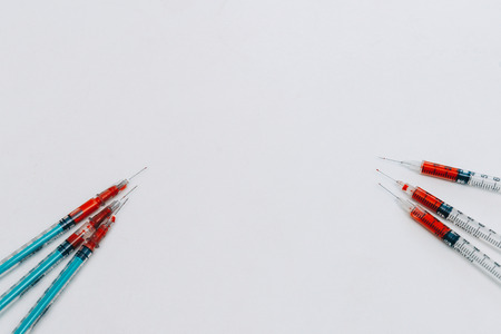 Treatment against addiction. Syringe with blood. Immunodeficiency. Treatment of addictionの写真素材