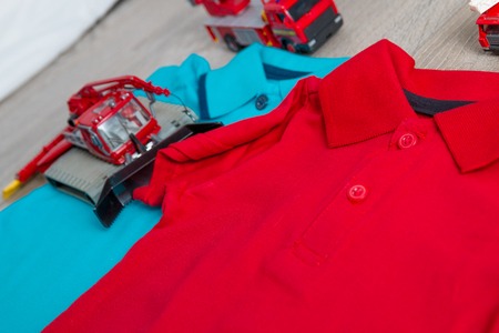 Two polo red and blue near set of car toy. Close up