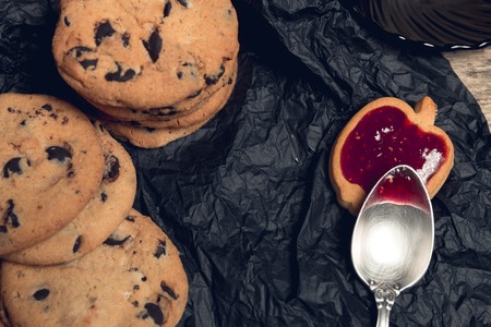 cookies and biscuits on black table background. Afternoon break time. Breakfast.の写真素材