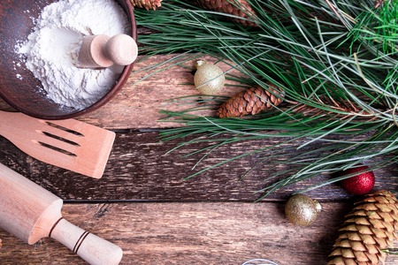 Ingredients for cooking Christmas baking on wooden background. Top view, copy space. Flat lay. Christmas decorationの写真素材