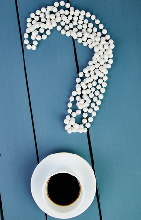 Concept in search ideas.  Question mark beads and cup of coffee.
の写真素材