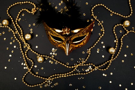 Black and gold carnival mask. Top view image of masqueradeの写真素材