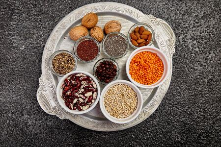 Beans and nuts selection in bowls. Healthy foodの写真素材
