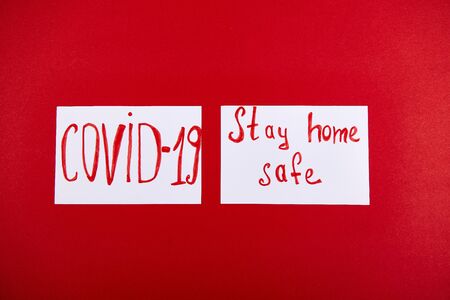 Words stay at home, Social Distancing wording. Epidemic, social isolation, coronavirus COVID-19 concept. Self quarantine at home as preventative measure against virus outbreak. Flat lay.の写真素材