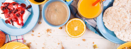 Banner of Healthy Breakfast. Various Assortment Set. Orange Juice, Granola, Croissant Coffee and...