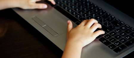 Close up of girls hand with notebook, Schoolgirl studying at home with a notebook and doing school...