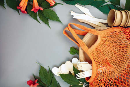 Flat lay of eco craft paper and wooden tableware, Zero waste, plastic-free and eco-friendly living,...