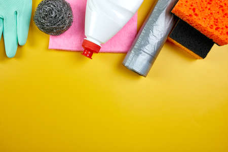 Flat lay of variety house cleaning product on color table with copy space, cleaning set for different surfaces, Detergents service concept, Top view.の写真素材