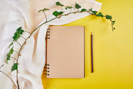 Flat lay top view notebook, notes with flowers Future family, house, life goals and plan or starting...