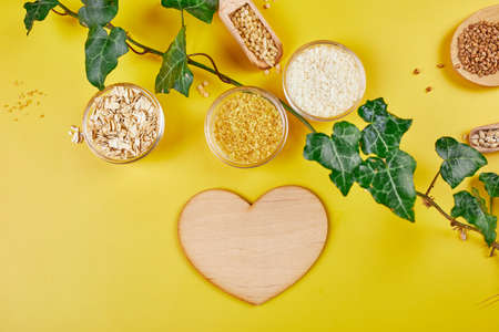 Flat lay of set heap various grains and cereals bulgur, rice, oatmeal, buckwheat, couscous wheat...