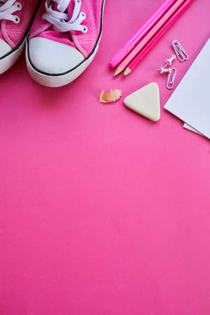 Pink Flat lay Back to school concept, School and office supplies on with copy space. Lots of different stationery items on colorful backgroundの写真素材