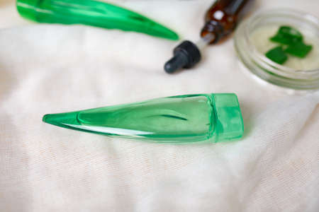 Flat lay of homemade skin care natural ingredients plant aloe vera gel, skinimalism, slow beauty on...