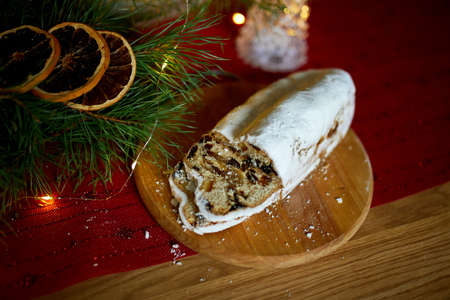 Stollen German christmas bread, Christmas stollen on wooden background, Traditional festive pastry...