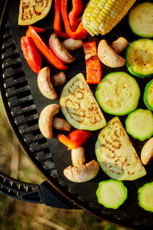 Roasting vegetables on the barbecue gas grill outdoor in the backyard, Vegetables On Grill, summer...