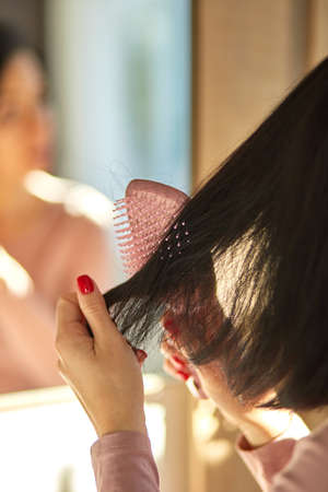 Problem hair loss concept, losing hair on hairbrushの写真素材