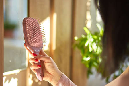 Problem hair loss concept, losing hair on hairbrushの写真素材