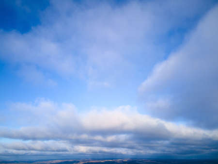 Beautiful blue sky with clouds background, Sky clouds and sun, Colorful cloudy sky at sun. Time Lapseの写真素材