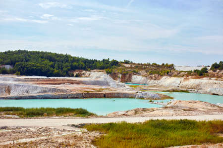 Quarry extraction porcelain clay, kaolin, with turquoise waterの写真素材