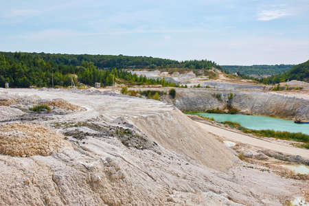 Quarry extraction porcelain clay, kaolin, with turquoise waterの写真素材