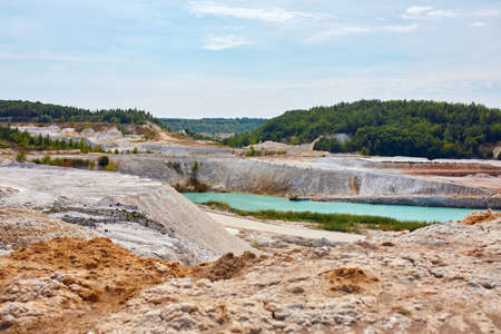 Quarry extraction porcelain clay, kaolin, with turquoise waterの写真素材