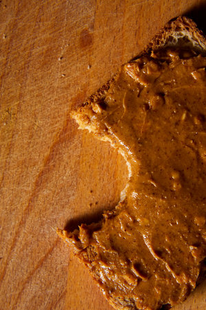 Top view of peanut butter toast sandwich, breakfast. Vegetarian food, american cuisine. Top view