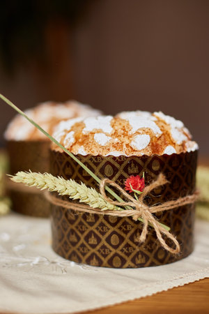 Easter cake with rustic decoration, wheat on wooden table the holiday, Happy Easter Holiday.