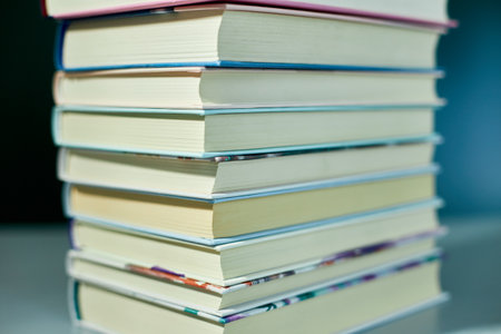 Stack of books on dark backgrounds, World book day, knowledge and creativity concept, spring, summer...