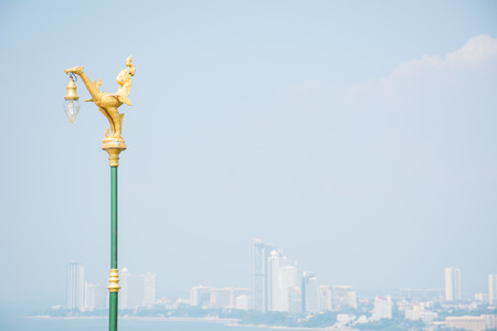 Hong light pole with pattaya beach and town in backgroundの写真素材