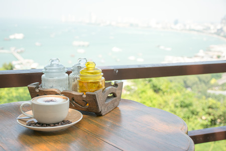 Hot cappuccino / Relaxation time on summer holidaysの写真素材