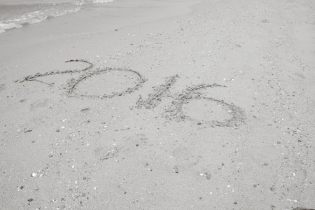 Happy new year 2016, on the beach and sand