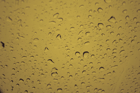 Abstract Water Drops on glass, use for Backgroundの写真素材