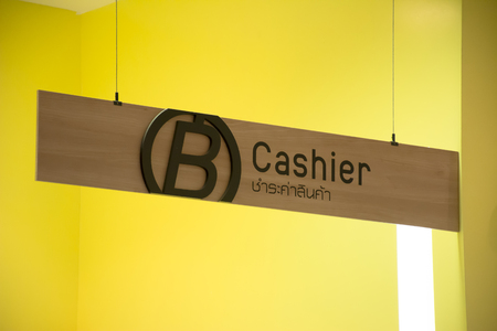 Cashier sign in big shopping mall, indicating location to pay
