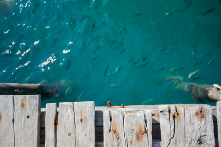 Summer, Travel, Vacation and Holiday concept - Beautiful wooden pier at a beach in Koh wai island, Trat, Thailand.の写真素材